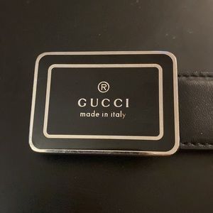 GUCCI black leather belt.